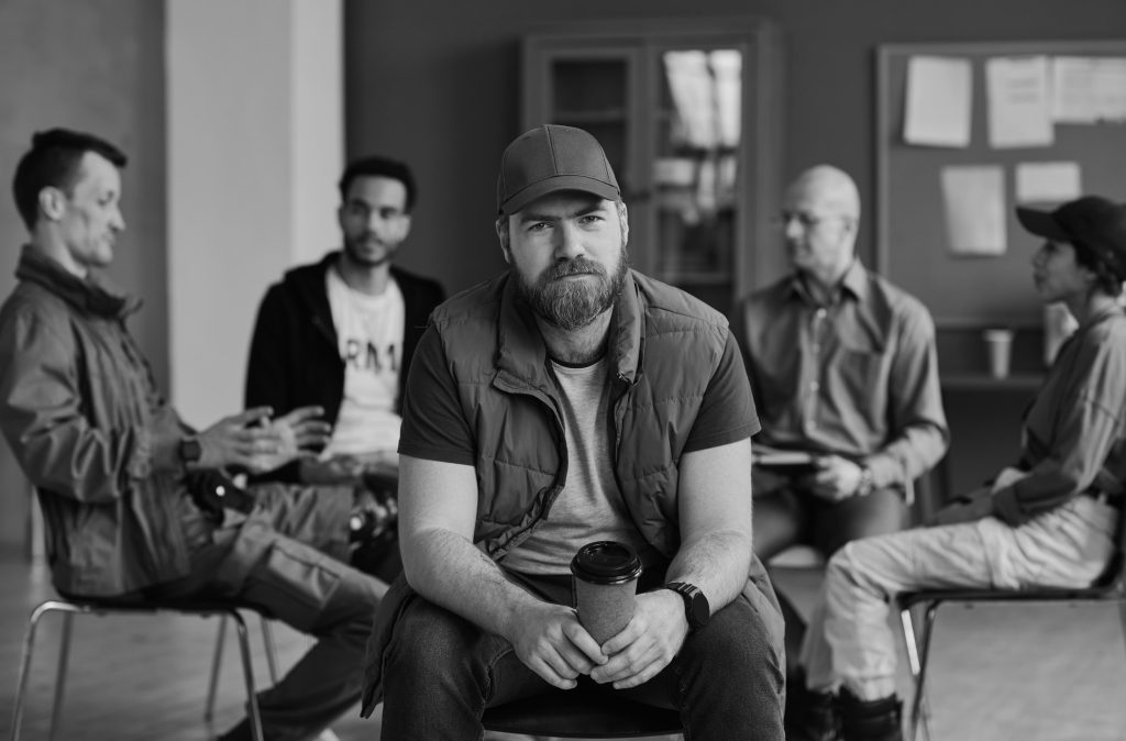 bearded man in christian small group seeking help with depression