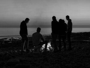 Group of men discussing faith, prayer and fasting in community with other Christian men